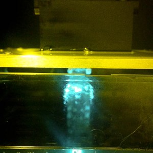 The 3D printer uses UV laser to cure the resin