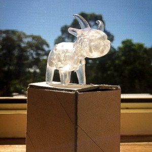 After the model is removed from the build plate, it is then submerged in Isopropyl Alcohol for 15 minutes to remove the excess resin